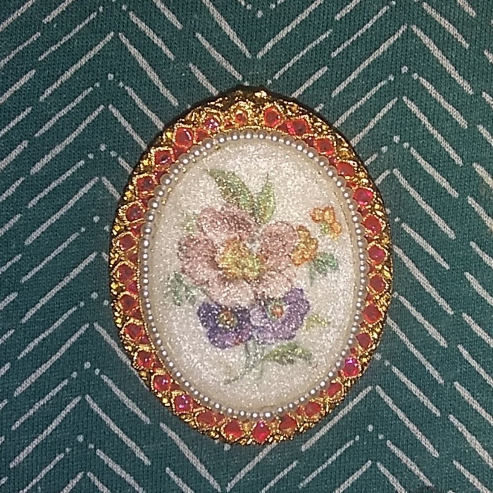 A brooch pin and bracelet